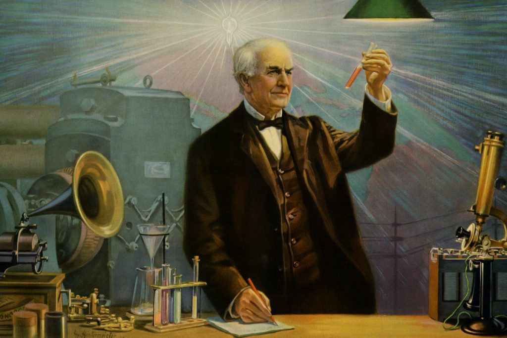Thomas Edison with a motion picture camera